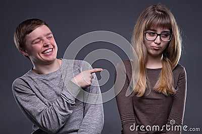 Mockery young man and woman Stock Photo