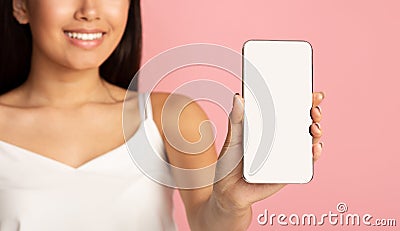 Mockup for app. Girl showing phone empty screen to camera Stock Photo