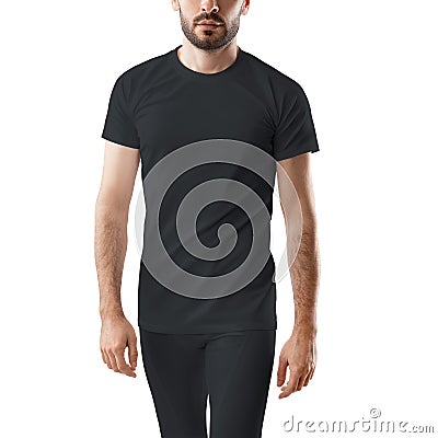 Mockup of black compression pants and t-shirt on a sporty man with a beard, for design, pattern, front Stock Photo