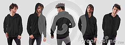 Mockup of black hoodie with pocket, zip fastener on posing guy in jeans, isolated on background Stock Photo