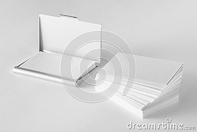 Mockup of blank business cards stack and cardholder Stock Photo