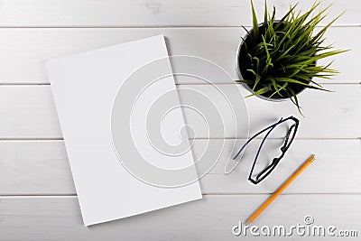 Mockup with blank magazine cover on wooden table Stock Photo