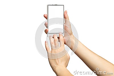 Mockup of female hands holding modern white cellphone with blank screen Stock Photo