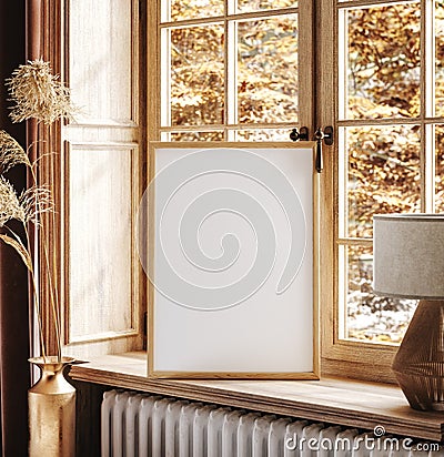 Mockup frame close up standing near window at autumn time Stock Photo