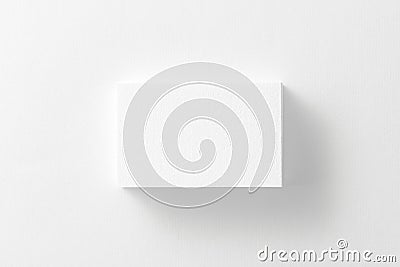 Mockup of horizontal business card stack at white textured background. Stock Photo