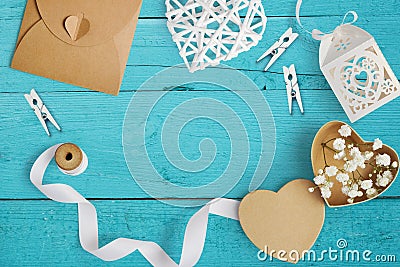 Mockup Letter with paper hearts, kraft box with flowers for greeting card St. Valentine`s Day in rustic style with place Stock Photo