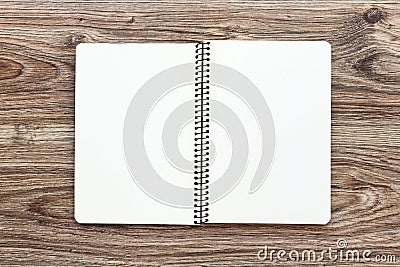 Mockup of open notepad with blank pages on wooden background. Stock Photo