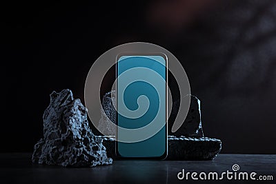 Mockup photo of Mobile Phone. Smartphone Screen as Clipping path. Dark Scene Stock Photo