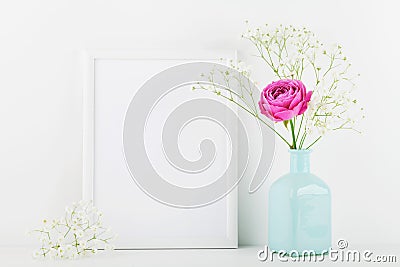 Mockup of picture frame decorated rose flower in vase on white background with clean space for text and design your blogging. Stock Photo