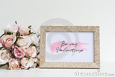 Mockup Picture frame and pink roses. Valentines Day Background concept with copy space. Mock up with photo frame and flowers with Stock Photo