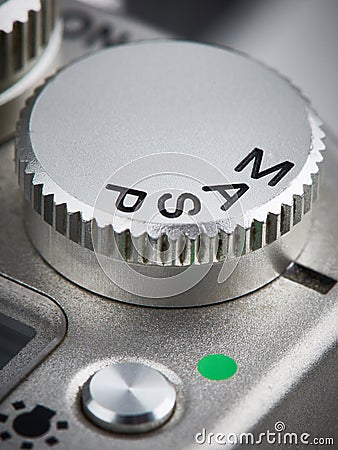 Mode control dial on SLR camera Stock Photo