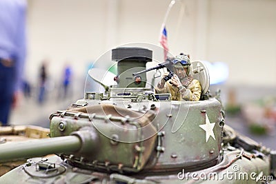 Model American tank M4 Sherman on radio control with tankman Stock Photo