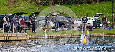 Model boat club members with model yachts on lake in Warminster, Wiltshire, UK Editorial Stock Photo