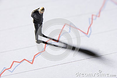 Model Businessman Studying Graph Stock Photo