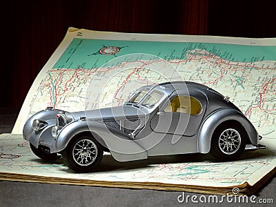 Model Car on Road Map Stock Photo