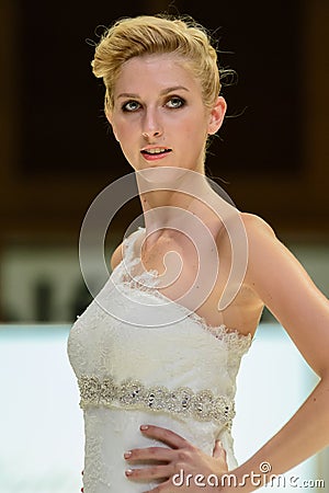 Model on catwalk wearing bridal gown Editorial Stock Photo