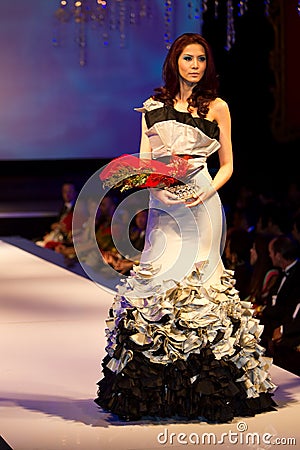 A model displays a creation by designer Melvin Lam Editorial Stock Photo