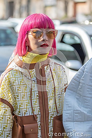 Model with fuchsia bob hair wearing a Fendi dress Editorial Stock Photo