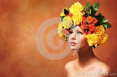 Model Girl with Flowers Hair. Hairstyle. Fashion Beauty Woman Stock Photo