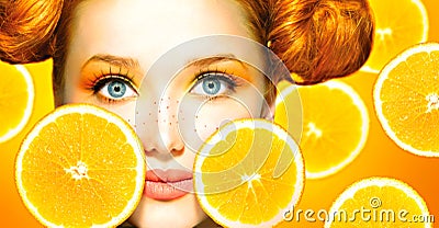 Model girl with juicy oranges Stock Photo