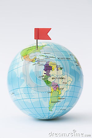 Model Globe With Red Flag Pin In North America Stock Photo