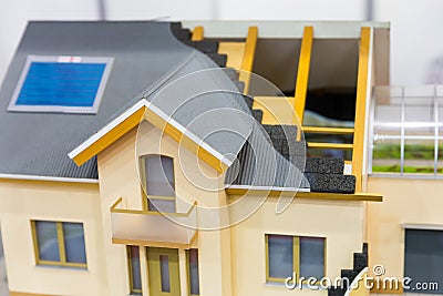 Model of house, thermal insulation of roof concept Stock Photo