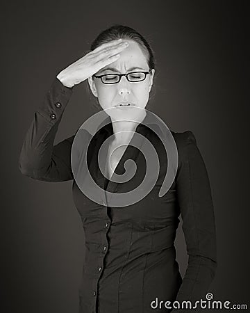 Model isolated on plain background ashamed hiding Stock Photo