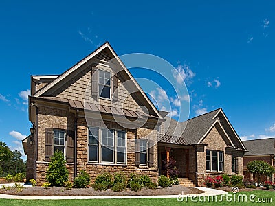 Model Luxury Home Exterior angle view sidewalk Stock Photo