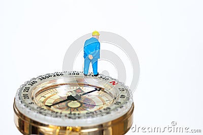 Model miniature on compass on white Stock Photo