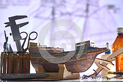 MODEL OF THE OLD SHIP FRIGATE MADE IN HANDS FROM THE CARDBOARD Stock Photo