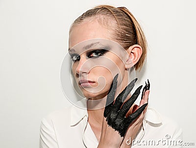 A model posing backstage during Kaimin Ready to Wear Spring/Summer 2020 fashion show Editorial Stock Photo