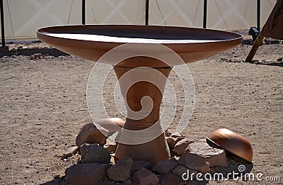 Bronze washing bowl, Model of Tabernacle, tent of meeting in Timna Park, Negev desert, Eilat, Israel Stock Photo