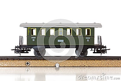 Model Train`s Vintage Passenger Car on the Rails Stock Photo