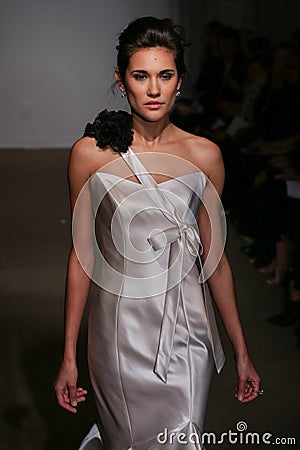 A model walks the runway at the Anna Maier / Ulla-Maija Couture Bridal Spring/Summer 2016 Runway Show Editorial Stock Photo