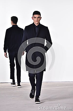 A model walks the runway at Carlos Campos fashion show during the New York Fashion Week Men's Fall/Winter 2016 Editorial Stock Photo