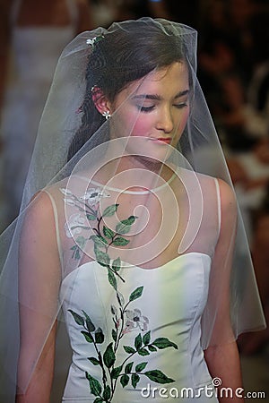 A model walks the runway at the Carolina Herrera Bridal Spring/Summer 2016 Runway Show Editorial Stock Photo