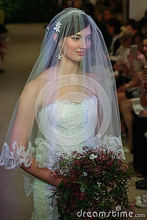 A model walks the runway at the Carolina Herrera Bridal Spring/Summer 2016 Runway Show Editorial Stock Photo