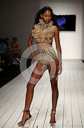 A model walks runway in designer swim apparel during the Furne Amato fashion show Editorial Stock Photo