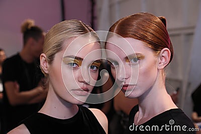 Models posing backstage before the Custo Barcelona fashion show Editorial Stock Photo