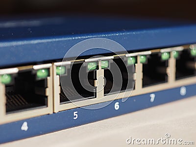 Modem router switch with RJ45 ethernet plug ports Stock Photo