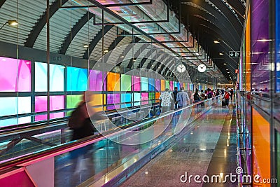 Modern airport moving walkway indoor with travelers. Transport corridor Editorial Stock Photo