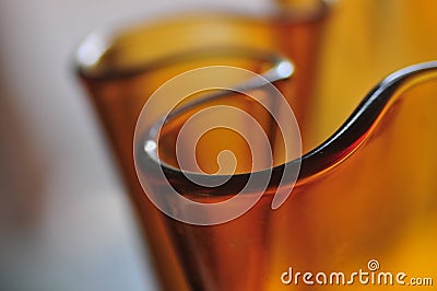 Modern Amber Glass Art Vase Abstract Mood Curves Series Background Stock Photo