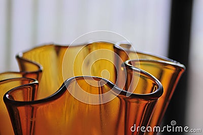 Modern Amber Glass Art Vase Abstract Mood Curves Series Background Stock Photo
