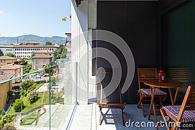 Modern apartment balcony with glass parapet Stock Photo