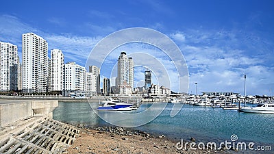 Modern apartments and yacht harbor in Dalian, one of the most livable Chinese cities Stock Photo