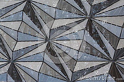 Modern architecture facade of grid panels in triangular pattern Stock Photo
