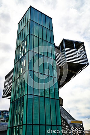 Modern architecture - green glass elevator Stock Photo