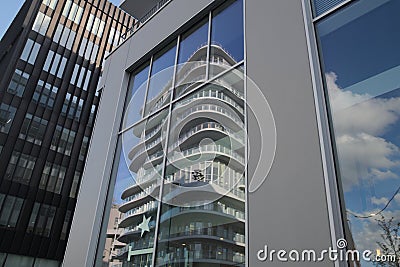 Modern architecture street in paris batignolles france mirror reflections of the building glass facade Stock Photo