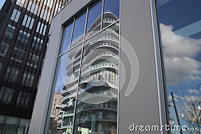 Modern architecture street in paris batignolles france mirror reflections of the building glass facade Editorial Stock Photo