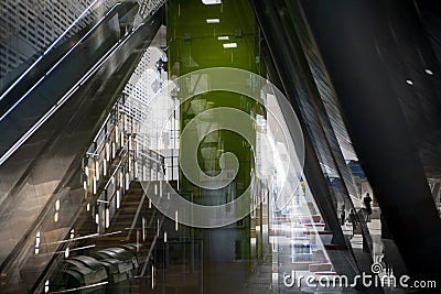 Modern architecture Tube DLR station with escalators, Multiple exposure image. London, UK Editorial Stock Photo